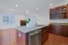 A bright and inviting kitchen that opens directly to the main living spaces, making entertaining effortless.