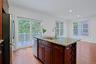 Thoughtfully designed for today's lifestyle, the kitchen enjoys easy sightlines to both the dining and living areas.