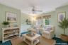 This very cozy lofted area can be converted to a third bedroom if needed. Is carpeted and has ceiling fan.