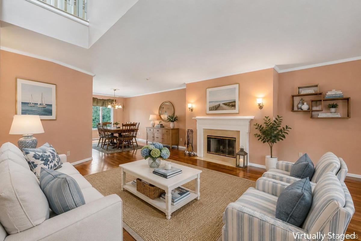 Living room has wood-burning fireplace