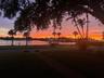 Sunset on the water from the front porch  at 110 Sunset Dr S!!