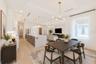 Virtually staged. Light and bright Dining area.