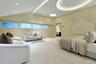 Designed as a private retreat, the primary bedroom combines generous proportions with a tranquil, light-filled setting.