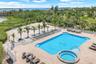 beautiful heated pool with spa and beach volley ball court and bocce court