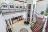 elegant staircase and glass elevator