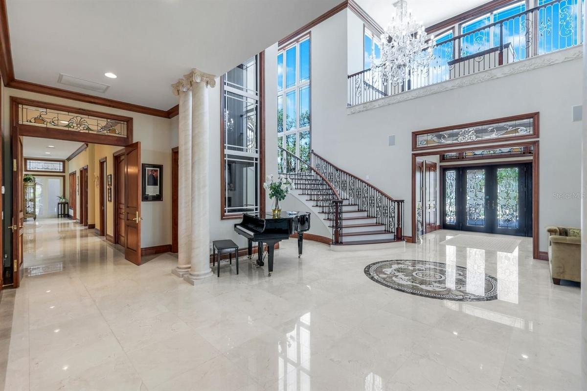 front foyer with glass elevator that acesses all floors fron garage to roof top