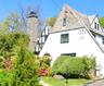Offered for the first time in over 20 years, 133 Bon Air Avenue is a timeless Tudor distinguished by its iconic stone chimney, classic architecture, a