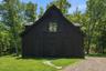 Barn houses a gym, a full kitchen and a private guest suite, a studio/recreation room, and farmequipment storage and workshop.