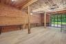 Barn studio space filled with light, glass garage door