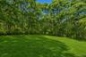 Backyard protected by parkland
