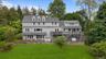 From the rear view of this special home you can appreciate the over 3100+ SF of livable space including a walk-out lower level.
