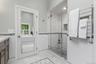 The walk-in Shower with two shower heads completes the spa-like atmosphere.