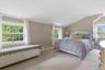 Generously sized second Bedroom with two closets plus a window seat.