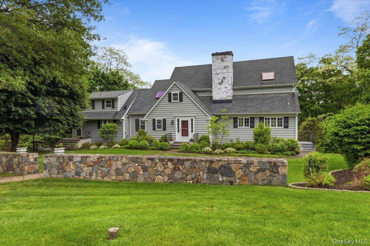 Charming home with an expanded main floor and all bedrooms on the 2nd level. 4 1/2 updated. bathrooms!