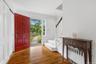 Let's step inside the entrance foyer with a double coat closet. Six panel colonial doors throughout the home.