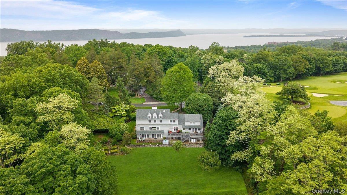 Aerial view shows the spectacular 1.56 acres plus its proximity to SHCC golf course & to the Hudson River.