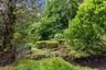 This lovely garden area is professionally landscaped off the rear patio.
