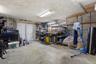 An added bonus is the very large unfinished basement with a workshop area, and, not pictured, a room with a large new stainless steel utility sink. On