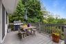 The large Trex deck off the Family Room (connected to the Dining Room deck) offers views of the backyard and golf course.