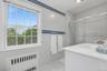 Updated full Bathroom on the bedroom wing with combined bathtub/shower.