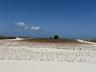 Large beach area with paths