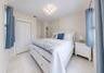 Primary Bedroom with Closet and Built-in Shelving