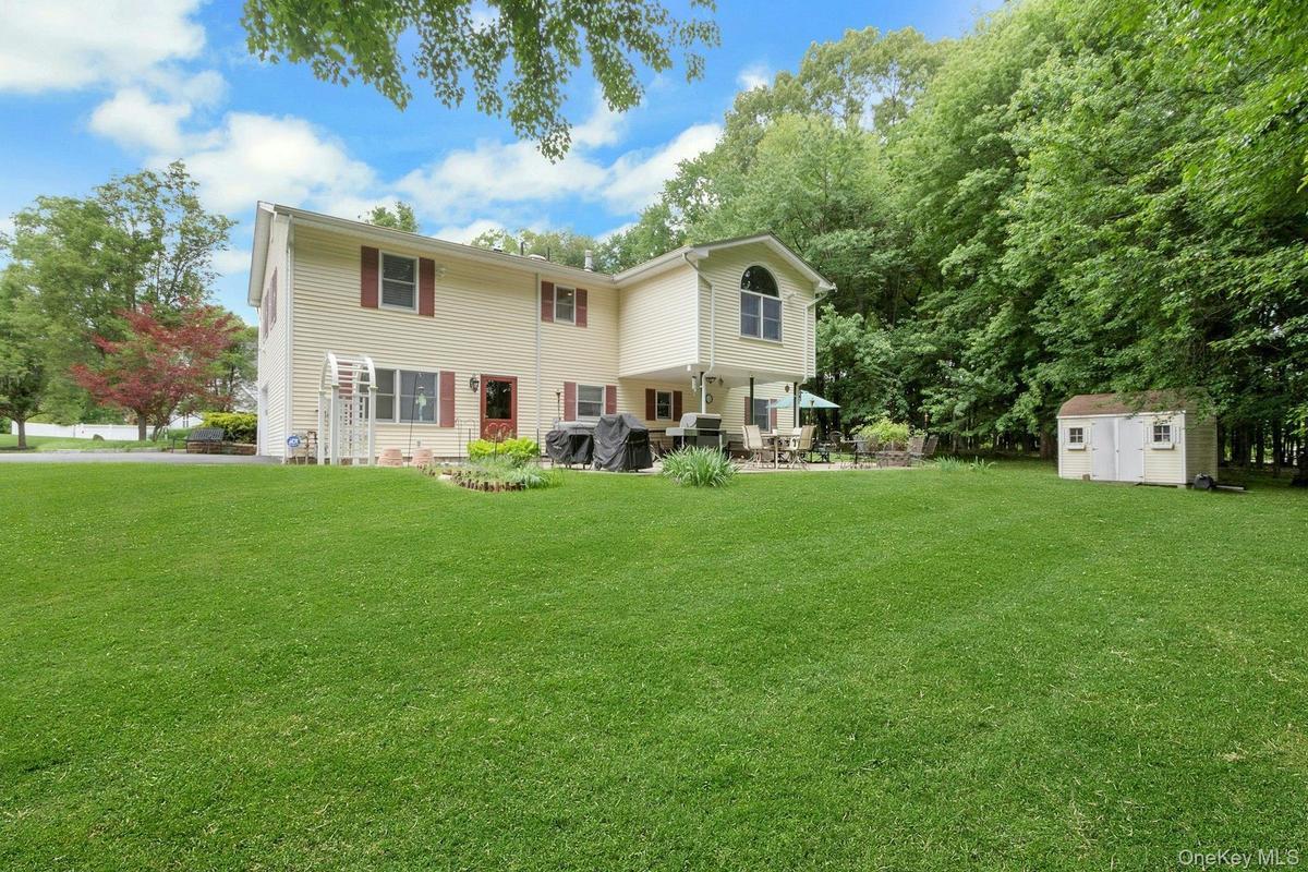 Back of house and yard, expansive, level, private