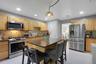 Kitchen with stainless appliances and center island