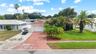 2 car Garage plus extra Shell Parking Pad for Golf Cart, Boat, 3rd vehicle, etc.