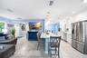 Kitchen & Living Room with SPacious Bar for entertaining