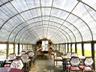 Sunroom with lofted ceiling