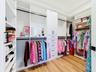 1 of 2 walk in closets in the primary suite