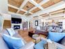 coffered ceilings enhance this family room area