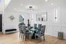 HUGE FORMAL DINING ROOM with custom millwork and lighting