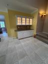 lovely coffee bar, service bar, lighted glass cabinets, pull out storage below,