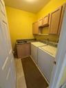 Laundry, w/sink, closets, hang up area, right off the kitchen and garage, main level