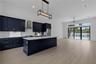 Dining/Kitchen overlooking living room