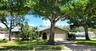 Great curb appeal, large corner lot & a pool!