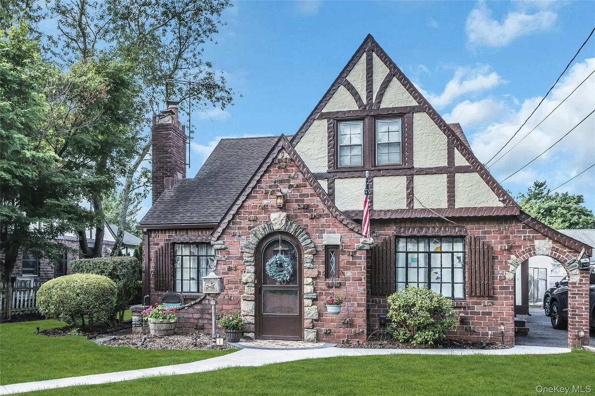 Charming Tudor located in the Westwood section of Malverne