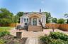 Beautiful pavers lead the way to this unique and versatile home!