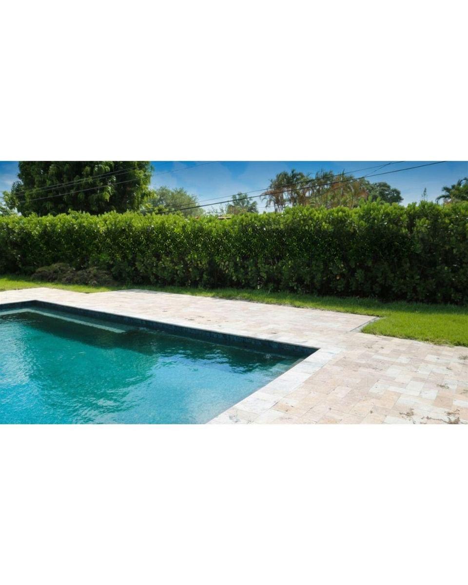 POOL WITH LOUNGE CHAIR AREARelax poolside in the heated saltwater pool surrounded by ample lounging space, perfect for entertaining guests or enjoyin