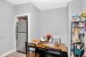 Kitchen with freestanding refrigerator and light wood-type flooring