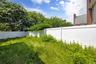 View of fenced backyard