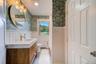 Lovely new bath finishes and new tile floor!