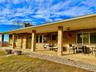 This hilltop home offers expansive views and a big sky feel!