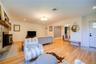 The living room has a nice flow to the bedroom/bathroom corridor or into the kitchen.