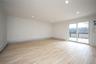 Family Room/Dining with a Brand New Deck overlooking the Premium River Conservation area.