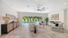 Open living area with pool views.