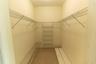 walk-in closet in primary bedroom
