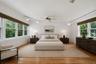 Virtually staged furniture in primary bedroom